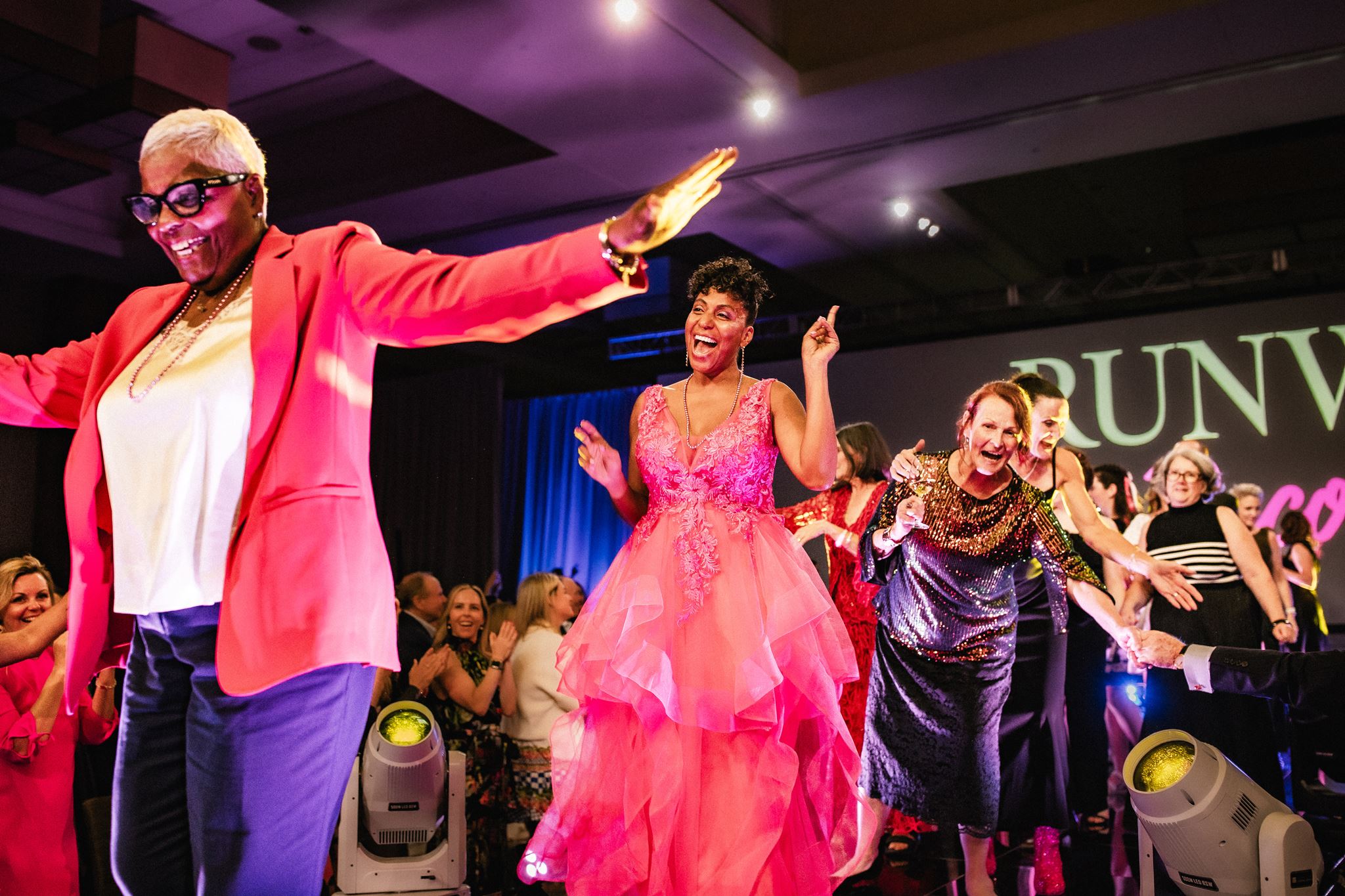 Runway for Recovery Models celebrating on stage